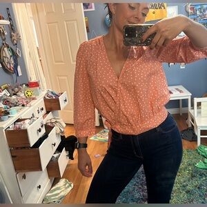 Made well blouse. Orange with stars.